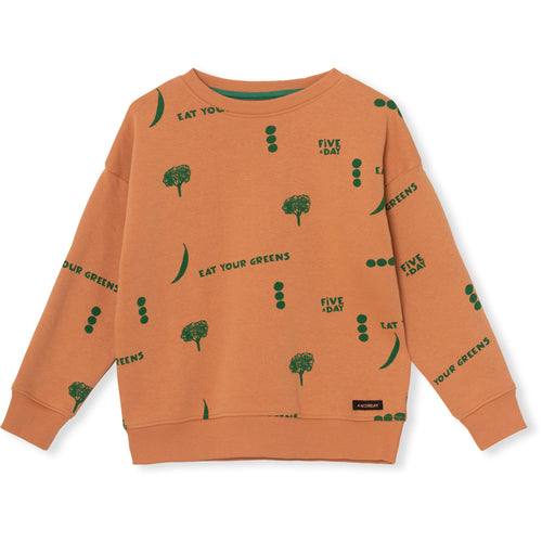 Littlefashionaddict - A Monday in Copenhagen - AW23 - The Food School - Louis Blouse Sweater Verdant Green Print - Voor jongens en meisjes - Vanaf 4 tot 12 jaar in stock en verkrijgbaar bij Little Fashion Addict