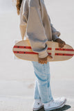 Banwood Skateboard - Natuurkleurig skateboard met donkerrode strepen voor kinderen vanaf 3 jaar - Verkrijgbaar bij Littlefashionaddict.com