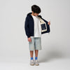 Gosoaky Blue Bird regenjas in donkerblauw voor jongens en meisjes -  Verkrijgbaar bij Little Fashion Addict