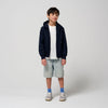Gosoaky Blue Bird regenjas in donkerblauw voor jongens en meisjes -  Verkrijgbaar bij Little Fashion Addict