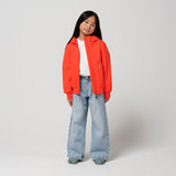 Gosoaky Blue Bird jas in opvallend rood met reflecterende details - Waterdichte meisjesjas Poppin Red van Gosoaky - Verkrijgbaar bij Little Fashion Addict