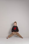 Jenest Maggy Pants Caramel Brown – bruine ribfluwelen ballonbroek voor meisjes met elastische tailleband | Verkrijgbaar bij Little Fashion Addict