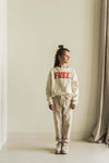 Elegante Ecru Sweater met vogelprint voor jongens en meisjes van het merk, Jenest. | Free Bird Sweater verkrijgbaar bij Little Fashion Addict