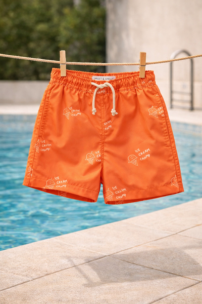 Oranje zwemshort met all-over ijsjesprint en trekkoord uit de Champions League of Fun van Sproet & Sprout - Verkrijgbaar bij Little Fashion Addict