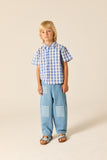 Lichtblauwe denim broek voor jongens en meisjes van Wander & Wonder met patchwork zakken. | Denim Patchwork Jeans Washed Denim | Verkrijgbaar bij Little Fashion Addict