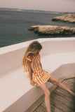 We Are Kids rok Oda Orange Stripes – Vrolijke rok voor meisjes in oranje en witte strepen, gemaakt van biologisch katoen | Verkrijgbaar bij Little Fashion Addict