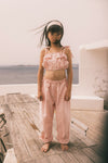 Pantalon Elia Pink Checks van We Are Kids – Vrolijke lichtroze meisjesbroek met ruitjespatroon, gemaakt van biologisch katoen | Verkrijgbaar bij Little Fashion Addict