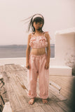 Pantalon Elia Pink Checks van We Are Kids – Vrolijke lichtroze meisjesbroek met ruitjespatroon, gemaakt van biologisch katoen | Verkrijgbaar bij Little Fashion Addict