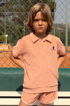 We Are Kids Polo Leonard Terry in oudroze, gemaakt van zachte 100% biologisch katoenen terry-stof. Voor jongens en meisjes vanaf 4 jaar. Verkrijgbaar bij Littlefashionaddict