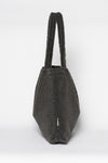 Handgemaakte donkergrijze Teddy Mom Bag van Studio Noos. Gemaakt van zachte teddy stof. Verkrijgbaar bij Littlefashionaddict.