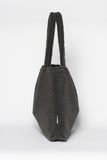 Handgemaakte donkergrijze Teddy Mom Bag van Studio Noos. Gemaakt van zachte teddy stof. Verkrijgbaar bij Littlefashionaddict.